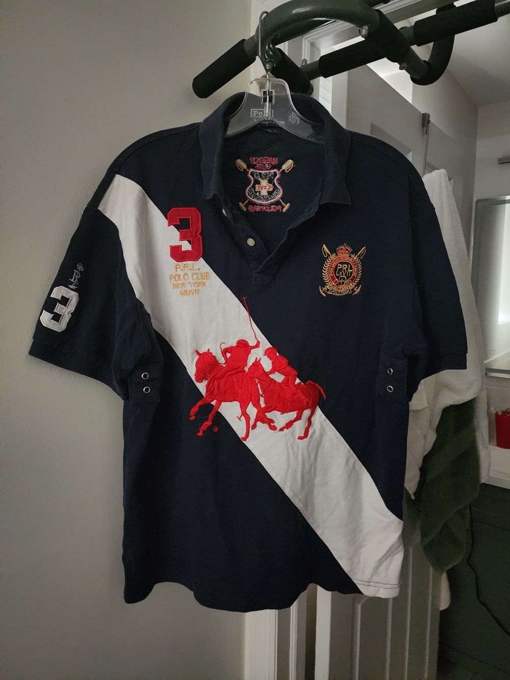 Ralph Lauren Navy Polo with White Diagonal Panel and Red Embroidery. S-M
